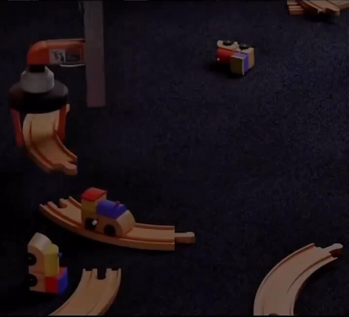 The image shows a collection of wooden toy cars scattered across a dark carpeted floor, with some cars positioned near each other while others are more spread out. The scene appears to be set up for children to play with or as part of an educational activity. The caption "What life feels like when you're not saving in bitcoin" suggests that the image is related to Bitcoin and cryptocurrency, possibly highlighting a humorous or satirical perspective on the subject.