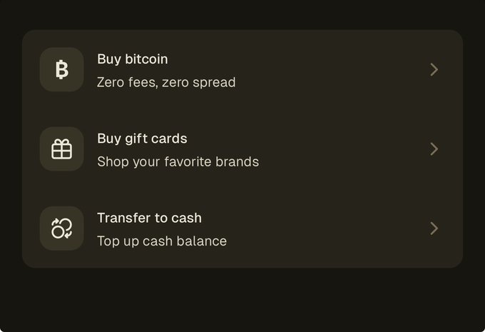 A mobile app menu screen displaying three options: 'Buy bitcoin - Zero fees, zero spread', 'Buy gift cards - Shop your favorite brands', and 'Transfer to cash - Top up cash balance.'
