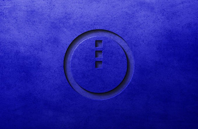 A minimalist textured blue background featuring a subtle embossed circular logo with three vertical rectangular shapes resembling a stylized letter.