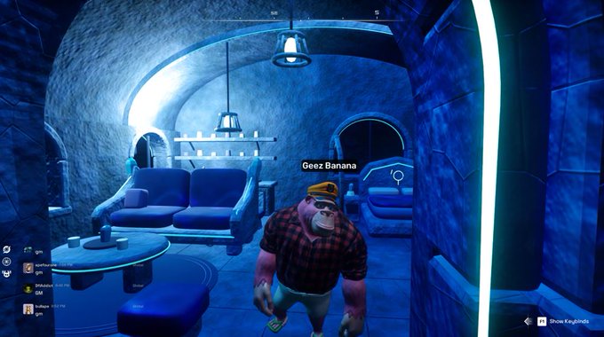 A video game screenshot showing a character labeled 'Geez Banana' wearing a yellow turban and plaid shirt, standing in a blue-lit lounge area with couches.
