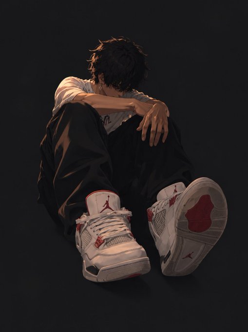An anime-style illustration of a young man with dark hair sitting hunched over in a white t-shirt and dark pants, prominently wearing white and red Air Jordan sneakers against a dark background.