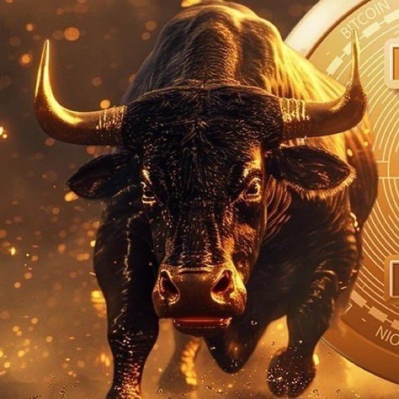 A bronze-toned, fiery bull charges forward alongside a Bitcoin coin in this dynamic image, symbolizing the explosive surge referenced in the post about $925 billion being added to the US stock market at the open. The intense, glowing aesthetic visually reinforces the "pumping hard" momentum described in the headline.