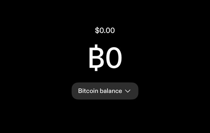 A black screen displays a cryptocurrency balance of "$0.00" with a "₿0" Bitcoin indicator and a "Bitcoin balance" dropdown menu.
