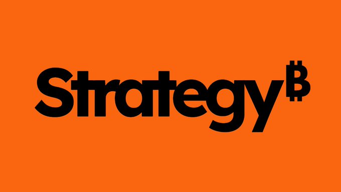 The image displays the Strategy (formerly MicroStrategy) logo, featuring the word "Strategy" in bold black text on an orange background with a Bitcoin symbol incorporated into the design, directly referencing the company's identity as a major Bitcoin-focused corporate holder discussed in the post.