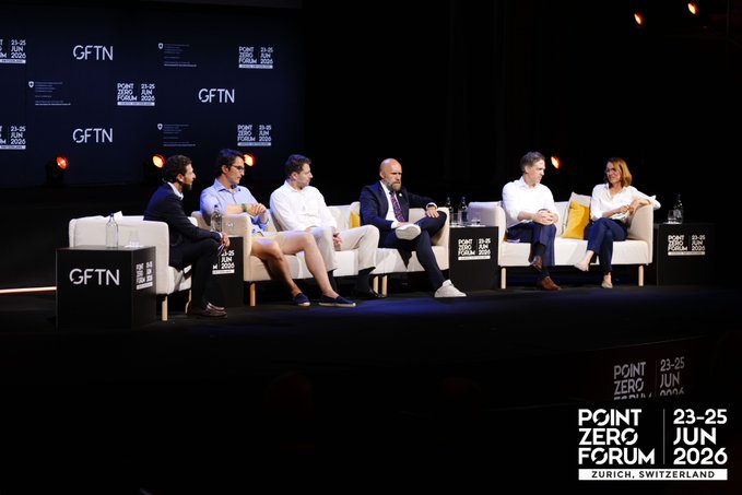 A panel discussion with six people seated on a stage at the Point Zero Forum (GFTN) held June 23-25, 2026 in Zurich, Switzerland.
