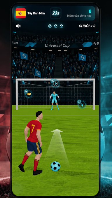 A soccer penalty shootout mobile game screen showing a player in a red jersey (number 7) preparing to take a shot against a goalkeeper, with "Tây Ban Nha" (Spain) displayed at the top, a 23-second timer, and "Universal Cup" branding visible in the stadium. The image directly relates to the post about participating in the Universal Cup penalty shootout challenge on Bitget, capturing the moment just before taking a crucial knockout-round shot.