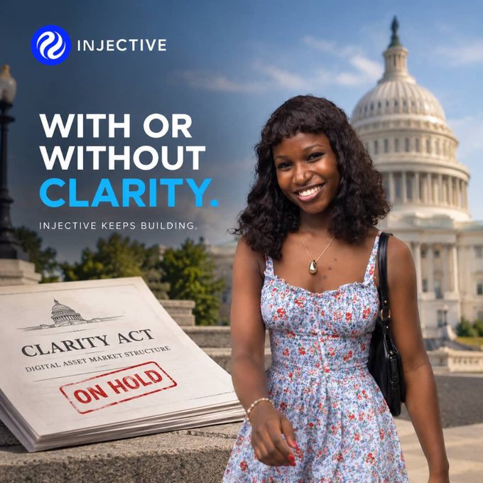 A promotional image for Injective featuring a smiling woman in a floral dress in front of the US Capitol, alongside a document titled 'CLARITY ACT - DIGITAL ASSET MARKET STRUCTURE' stamped 'ON HOLD,' with the text 'WITH OR WITHOUT CLARITY. INJECTIVE KEEPS BUILDING.'