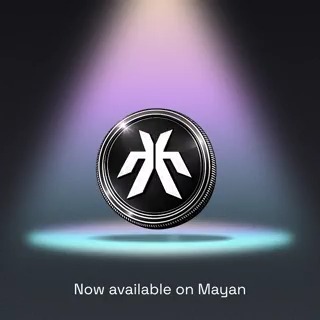 The image features a coin with an "X" symbol on it, which is the main focus of the post. The text at the bottom of the image reads "Now available on Mayan", indicating that the coin is now available for purchase on the Mayan cryptocurrency exchange. The post also mentions that the coin is from @xmaquina and is related to the DAO for robotics capital markets, which is a popular cryptocurrency project.