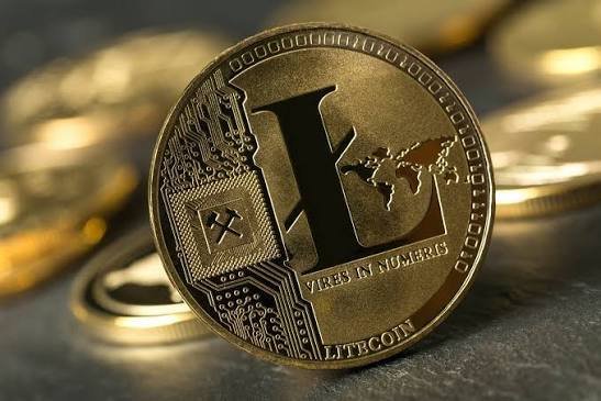 A close-up of a gold Litecoin ($LTC) coin displays the iconic "L" symbol, a world map, and the inscriptions "VIRES IN NUMERIS" and "LITECOIN," visually reinforcing the post's message about Litecoin's enduring reliability and longevity in the crypto space.