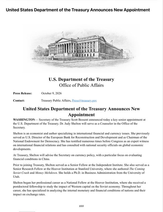 A Treasury press release dated October 9, 2026, announcing the appointment of economist Judy Shelton as Counselor in the Office of the Secretary, where she will advise on currency policy with a focus on China. The caption aligns with the congratulatory post highlighting her well-known advocacy for returning to a gold standard.