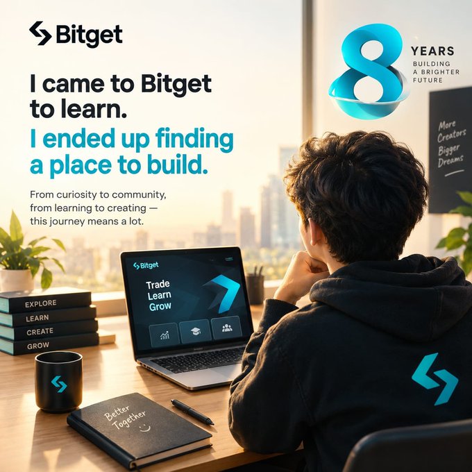 A person in a Bitget hoodie sits at a desk with a laptop displaying "Trade Learn Grow," surrounded by "Better Together" notebook and motivational books, celebrating Bitget's "8 Years Building a Brighter Future" milestone. The image captures the journey from curious learner to active builder, visually echoing the post's message of finding not just a platform to learn on, but a community to grow with.