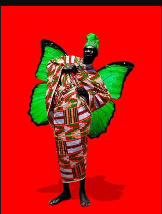 A digital collage showing a figure in traditional African patterned clothing and a green headwrap, with large green butterfly wings against a red background.