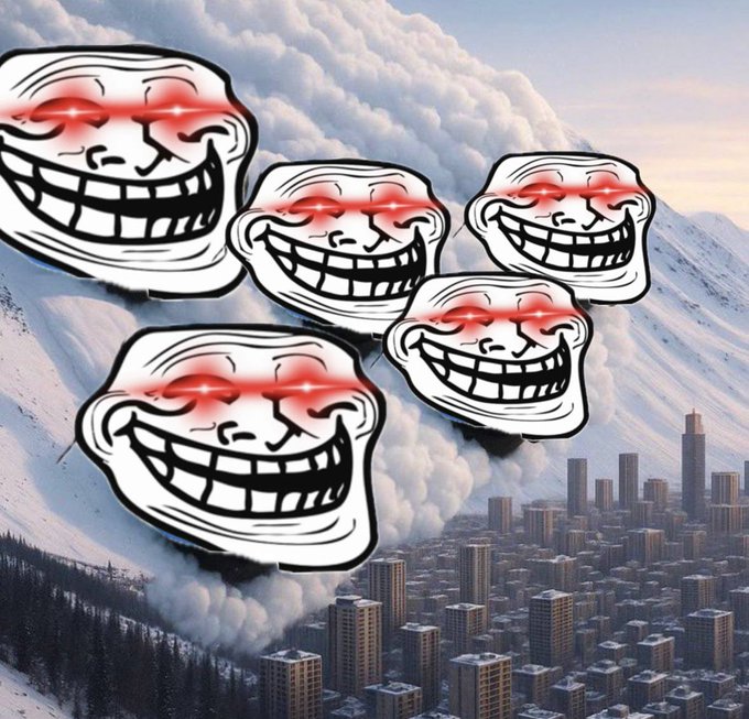 The image features a collage of five white faces with red eyes, each smiling at the camera. These faces are positioned above an urban cityscape that includes buildings and trees. The text "Calm before the storm.. $Troll" is also present in the image.