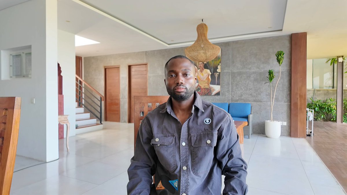 The image shows a man wearing a blue shirt sitting down inside an empty room with white walls and a wooden floor. The man appears to be posing for a photo or video, possibly for a social media platform like Instagram. The caption of the image reads "Crypto as We Know It Dies July 1, 2026 MiCA comes into full force on July 1, 2026". This suggests that the man is in an environment related to cryptocurrency and its impact on society.