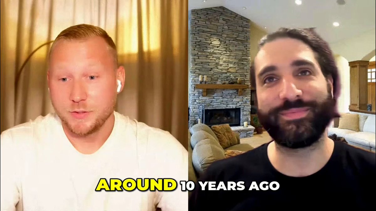 The image shows a man wearing a black shirt sitting next to another man who has a beard, both of them looking at the camera. The background features a living room with a couch and a fireplace. There are also some text elements in the image that read "Around 10 years ago", which could be related to the content of the post or possibly an unrelated detail about the scene.