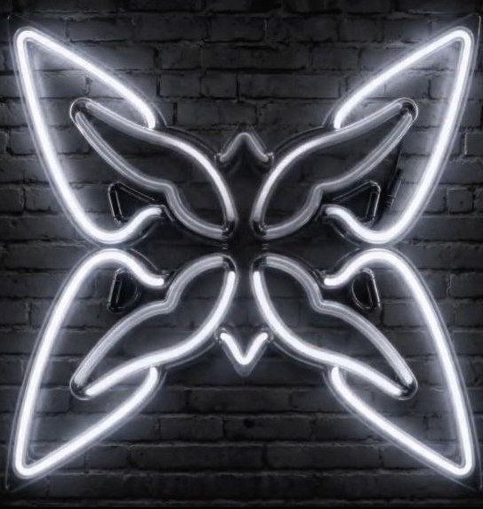 A glowing white neon butterfly is mounted on a dark brick wall, its symmetrical wing patterns resembling intricate circuitry. The luminous, high-tech aesthetic mirrors the quantum and digital innovation themes of the Quantum Echoes NFT drop.