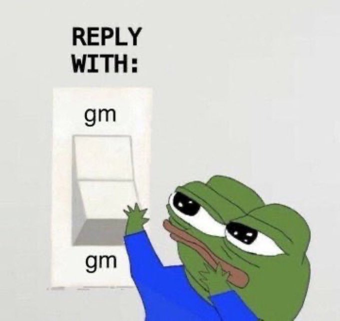 In this image, a cartoon frog is shown pressing a light switch with its left hand while wearing a blue shirt. The background of the image is white, making the frog stand out against it. Below the frog's action, there is text that reads "gm ct we go again today who’s joining me to on @quipnetwork and @TheARCTERMINAL?". This suggests that the image might be related to a social media post or a conversation about a specific event or topic involving the cartoon frog.