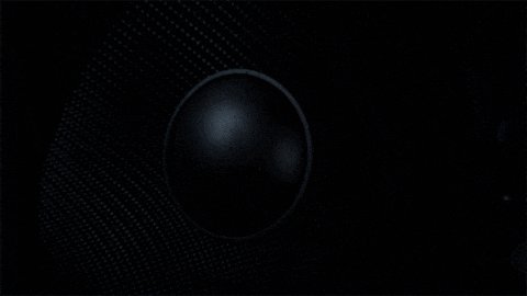 urn of black liquid with a small hole at the center, surrounded by a mesh pattern against a dark background.