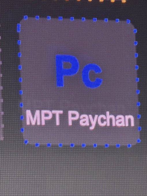 A close-up of an LED screen displays large blue “Pc” above white “MPT Paychan,” surrounded by a dotted blue rectangular border.