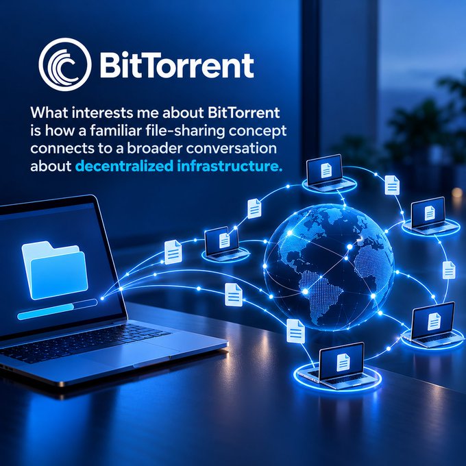 A promotional graphic for BitTorrent features a laptop connecting to a network of computers around a glowing globe, with text reading 'What interests me about BitTorrent is how a familiar file-sharing concept connects to a broader conversation about decentralized infrastructure.'