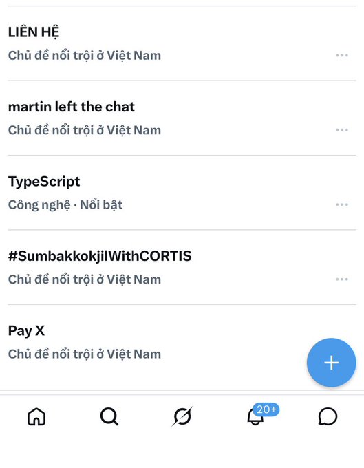 A mobile app interface displays a list of trending topics in Vietnam including "LIÊN HỆ," "martin left the chat," "TypeScript," "#SumbakkokjiIWithCORTIS," and "Pay X." Each entry is labeled with "Chủ đề nổi trội ở Việt Nam" (Trending topic in Vietnam), and a floating "+" button sits at the bottom right. The image contextualizes the post's frustration about not yet being featured as a top trending topic.