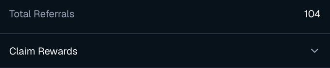 A dark interface shows "Total Referrals" with the number 104, and a "Claim Rewards" option below it with a dropdown arrow.