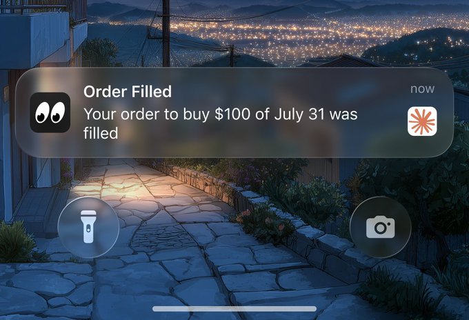 The image shows an iPhone screen with a message about an order being filled for $100 of July 31st. The text indicates that the order has been placed, but there are no images or other visual elements present.