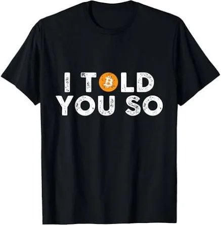 A black t-shirt displaying the text 'I TOLD YOU SO' with the 'O' in 'TOLD' replaced by a Bitcoin logo.
