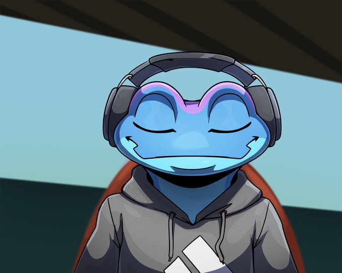 A blue frog mascot with closed eyes and a serene smile wears large headphones and a gray hoodie, perfectly embodying the post's message of zen focus and calm before the "Snek season" competition.