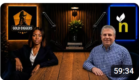 A podcast or livestream still titled 'GOLD DIGGERS PLAYBOOK' showing a woman in a blazer and a man in a checkered shirt at a wooden table, with a timer reading 59:34 and the 'h' logo.