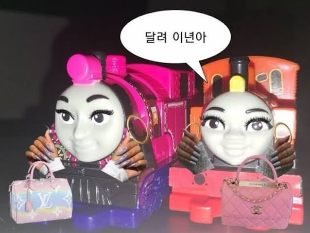 A meme featuring two animated train characters styled with large eyes and long nails, accessorized with designer bags, with a Korean speech bubble reading "탈려 이년이야".