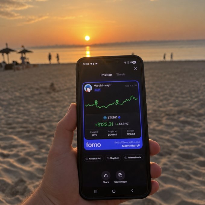 A hand holds a phone displaying a MarvinHarryP token portfolio at the beach during sunset, including “STONK,” “+$122.31,” and “43.81%.”