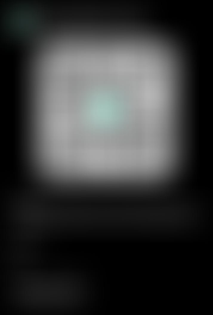 A heavily blurred, dark image with a faint glowing square in the center, showing no discernible details or text.