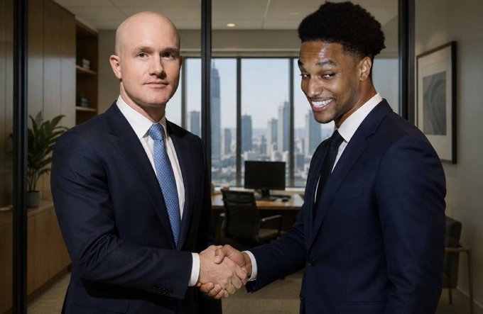 Two businessmen in dark suits warmly shake hands in a modern office with a city skyline view. The professional, deal-closing atmosphere of the image reinforces the post's enthusiasm for Coinbase potentially listing the $ANSEM token.