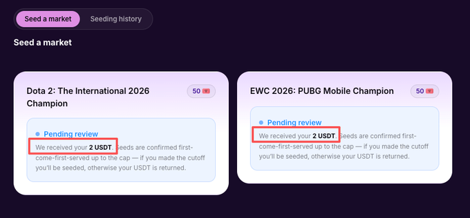 The image displays a "Seed a market" interface on a platform (likely @42space), showing two pending markets awaiting review: "Dota 2: The International 2026 Champion" and "EWC 2026: PUBG Mobile Champion," each requiring a 2 USDT entry with a cap of 50 participants, illustrating the reduced minimum stake mentioned in the post.