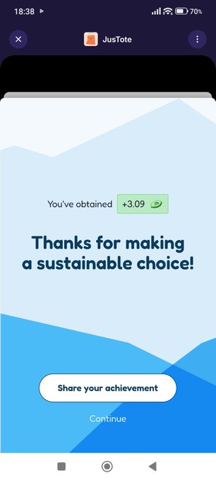 A JusTote app screenshot showing "Thanks for making a sustainable choice!" with a +3.09 points reward earned.