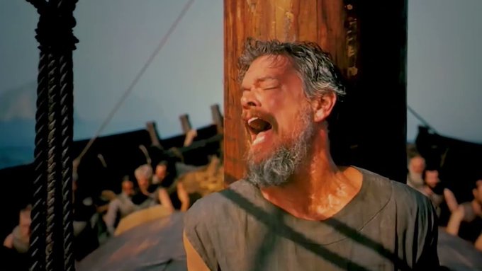 A bearded man with closed eyes and open mouth appears to be screaming or groaning in dramatic distress, set against a wooden ship-like backdrop with rigging. The image humorously illustrates the post's message about the regret of missing out on earning USDC rewards by not installing a particular skill, capturing that visceral "oh no" moment of realization.