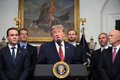 President Donald Trump stands at a podium bearing the Presidential Seal, addressing a group of suited officials in a formal room with an ornate framed painting in the background.

The image appears unrelated to the accompanying post, which discusses a stock market downturn and rebound with references to "ripple:native."