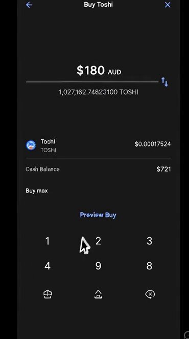 The image shows a cell phone screen with an app called "Buy TOSHI", which appears to be related to cryptocurrency trading or payment methods. There are several buttons on the screen, including one that says "Preview Buy". The background of the image is black and white, giving it a minimalist appearance.