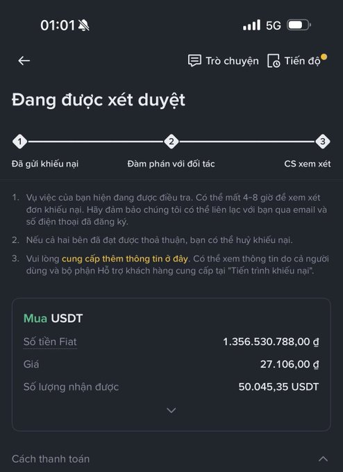 A Vietnamese-language mobile app screenshot shows a dispute review screen titled 'Đang được xét duyệt' (Under Review) with a 3-step progress timeline and details of a USDT purchase totaling 1,356,530,788 đ for 50,045.35 USDT.