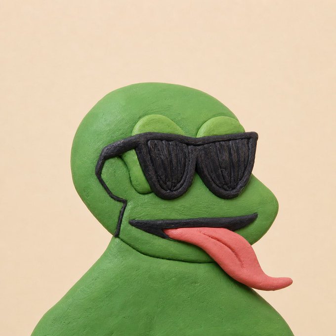 A clay sculpture of Pepe the Frog wearing sunglasses with his tongue out, humorously representing the post's message of "organic growth over whitelist farming" by depicting the meme in a handcrafted, authentic form rather than manufactured hype.