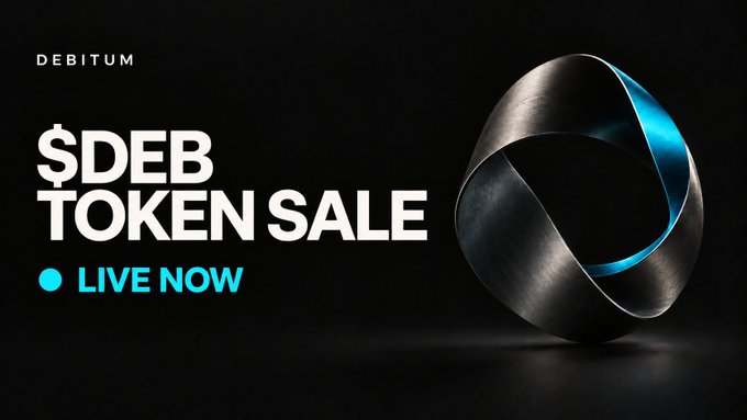 A promotional banner for 'DEBITUM $DEB TOKEN SALE LIVE NOW' featuring a metallic ring-like sculpture on a dark background.