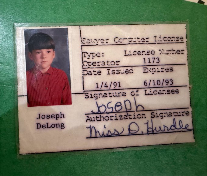 An old driver's license for Joseph DeLong, issued 1/4/91, expiring 6/10/93, with license number 1173, featuring a childhood photo in a red striped shirt.