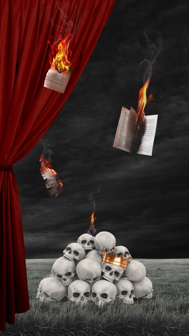 A dark, surreal image features a pyramid of human skulls topped with a golden crown in a grassy field, while pieces of burning paper float down from the sky next to a red curtain.
