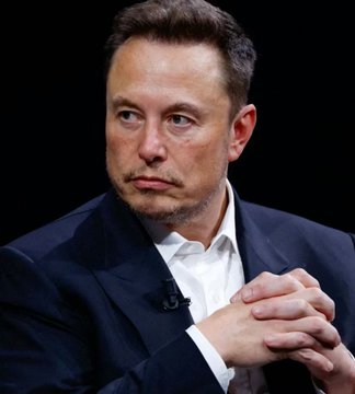 The image features a man dressed in a suit with his hands clasped together in front of him. He appears to be looking off into the distance or deep in thought. The caption above the image reads "SPACEX REPORTED TO IPO THIS WEEK, SAYS CNBC THEY CURRENTLY HOLD OVER 18,000 #BITCOIN". This suggests that the man might have been involved in a recent IPO event or has some connection to it.