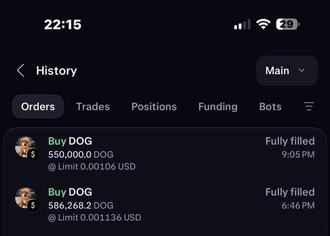 A mobile phone screenshot displays a cryptocurrency trading app history page at 22:15, showing two fully filled 'Buy DOG' orders executed at limit prices of 0.00106 USD and 0.001136 USD.