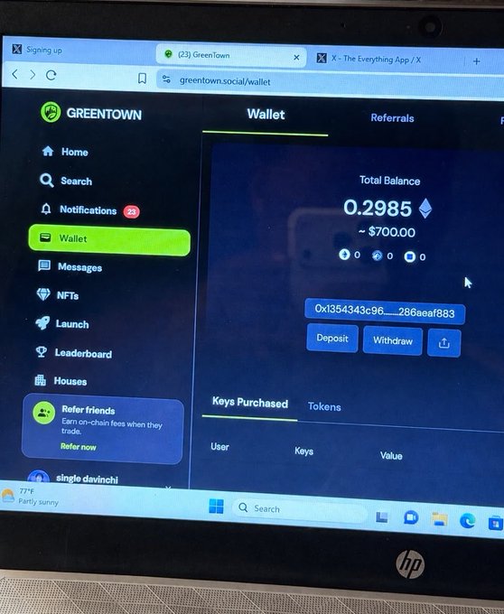 The image shows a Greentown social wallet interface displaying a total balance of 0.2985 ETH (~$700.00) along with the user's wallet address (0x1354343c96...) and deposit/withdraw options. This visually supports the post's claim of "$700 in the bag" by showing the actual crypto balance held in the Greentown platform, suggesting the user is sharing proof of earnings before revealing their strategy.