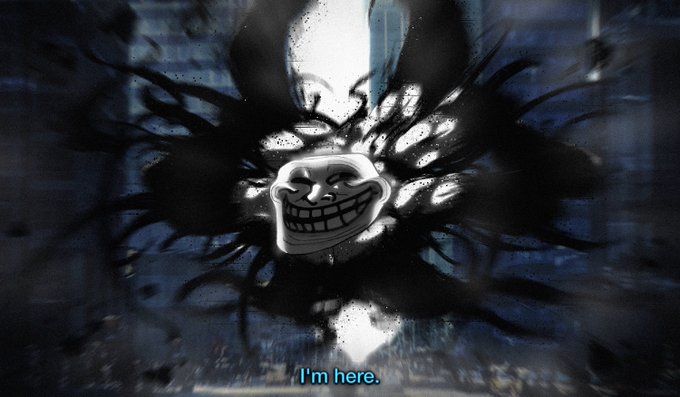 The image features an animated character with a face that looks like a monster or a scary creature. The character has multiple eyes and appears to be glowing with an eerie light. The background of the image is dark, which adds to the overall spooky atmosphere. Below the image, there's text that reads "experiencing $TROLL evolve what a time to be online if you're reading this, you're early". This message seems to be related to the character or the scene depicted in the image.