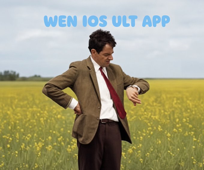 Mr. Bean stands awkwardly in a yellow rapeseed field, checking his watch impatiently, with the overlaid text "WEN IOS ULT APP" — a playful twist on crypto ticker symbols (#CRO, #APP, #ULT) used in the post to humorously convey impatience for the iOS app release.