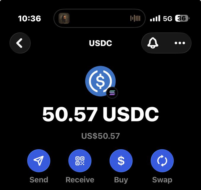 A mobile cryptocurrency wallet screen displays a USDC balance of 50.57 (US$50.57) on the Solana network, with options to Send, Receive, Buy, and Swap—likely shared as proof of funds to participate in a giveaway requesting Solana addresses.